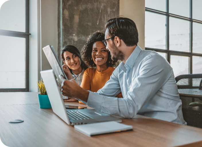 A Culture of Innovation and Teamwork Employees collaborate on a shared project